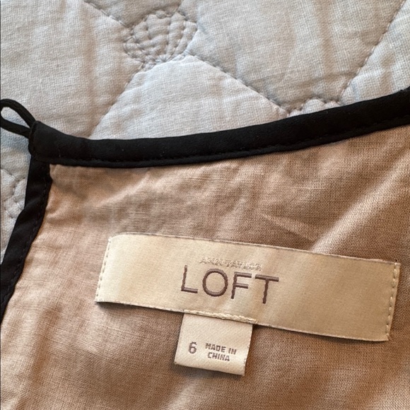 LOFT Black and Tan fit and flare dress with cut outs. - Picture 4 of 5